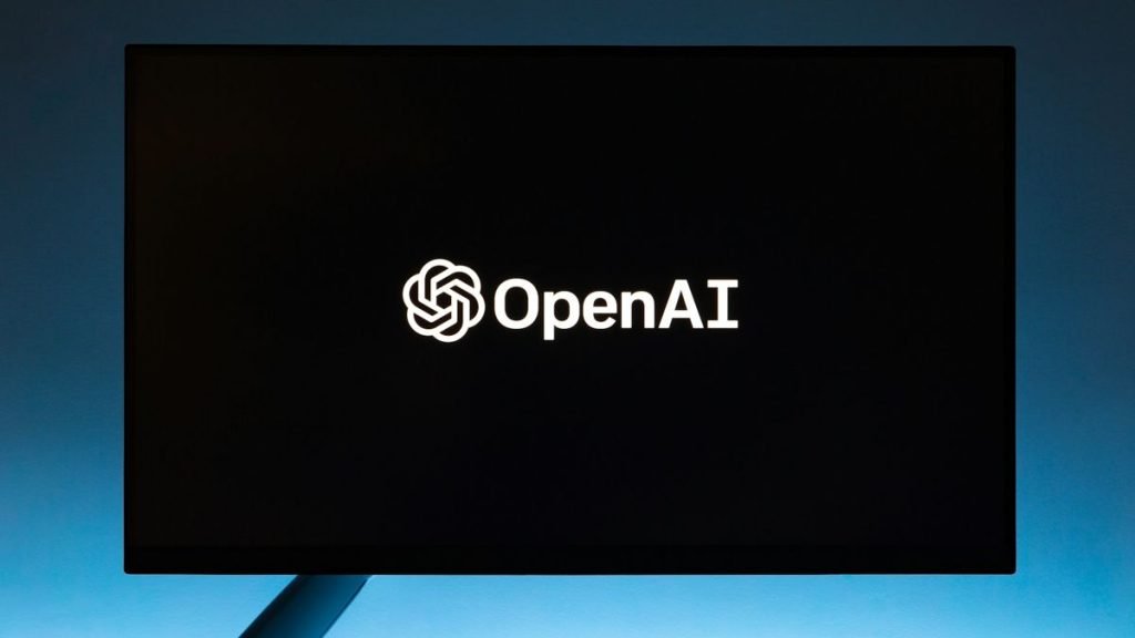 OpenAI logo on laptop display