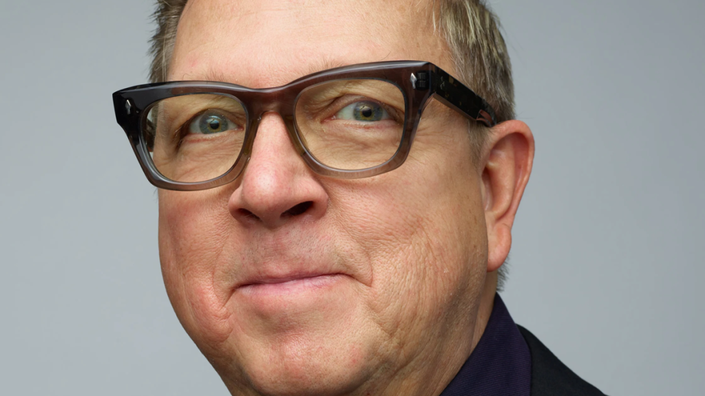 Man wearing glasses in close headshot