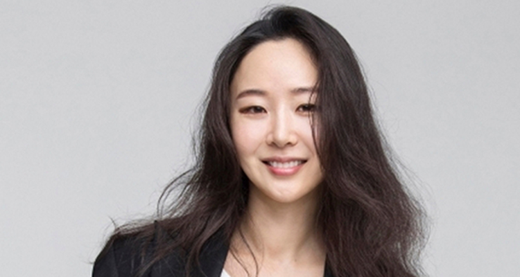 Min Hee-jin with dark flowing hair