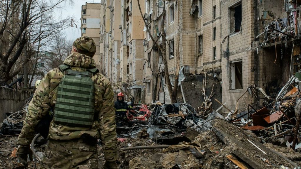 Russian soldiers in destroyed urban area