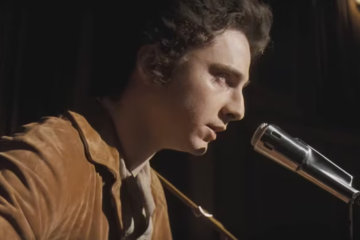 Bob Dylan performing onstage 1960s