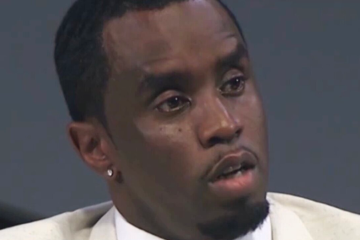 Sean Combs in white suit