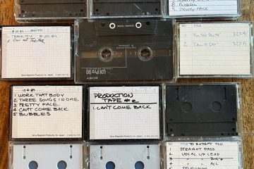 Vintage cassette tapes on wooden surface