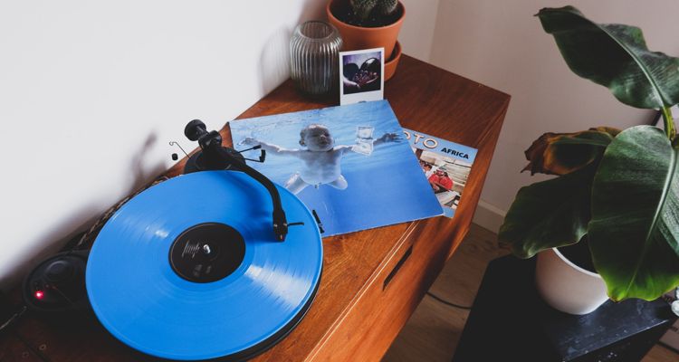 Blue vinyl record on turntable