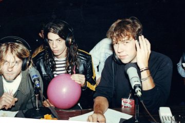 Nirvana members posing in recording studio