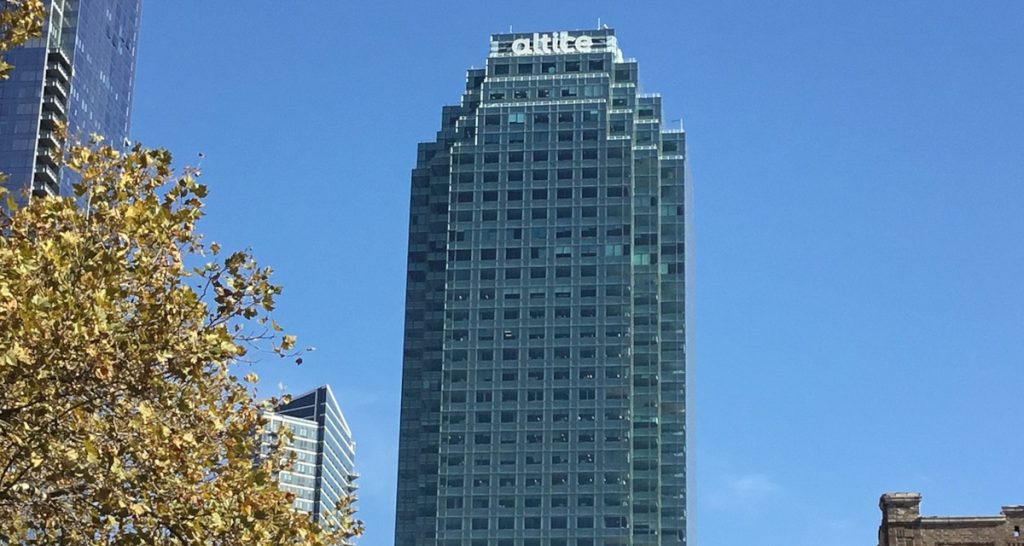 Altice headquarters against clouds