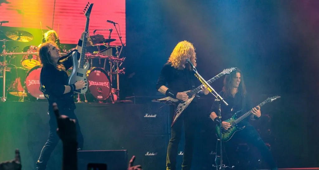 Megadeth performing live on stage